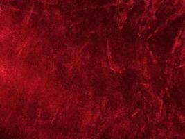 Dark red velvet fabric texture used as background. Empty dark red fabric background of soft and smooth textile material. There is space for text. photo