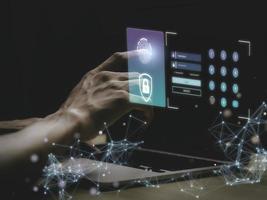 Person touching protecting personal information by fingerprint scanning, online financial transactions, secure access to computer networks and digital systems. Customer Data Protection cyber security. photo