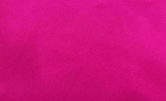 Pink velvet fabric texture used as background. Empty pink fabric background of soft and smooth textile material. There is space for text. photo
