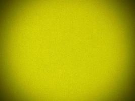 Yellow velvet fabric texture used as background. Empty yellow fabric background of soft and smooth textile material. There is space for text. photo