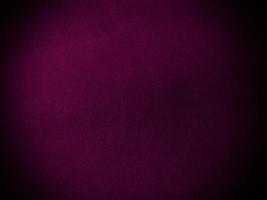 Dark magenta velvet fabric texture used as background. Empty magenta fabric background of soft and smooth textile material. There is space for text. photo