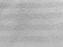 The texture of the old white fabric has a vintage dullness, there is a text area for the background, used for vintage wallpapers and designs. photo