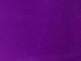 Purple velvet fabric texture used as background. Empty purple fabric background of soft and smooth textile material. There is space for text. photo