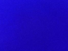 Dark blue velvet fabric texture used as background. Empty dark blue fabric background of soft and smooth textile material. There is space for text. photo
