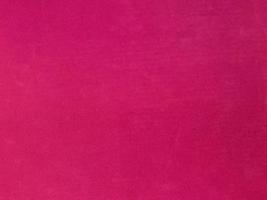 Pink old velvet fabric texture used as background. Empty pink fabric background of soft and smooth textile material. There is space for text. photo