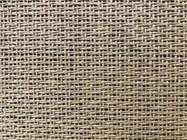 Close up  The  is woven into a net. natura rope texture as a background. Full frame of tightly woven rope pattern.with space for text, for a background. photo