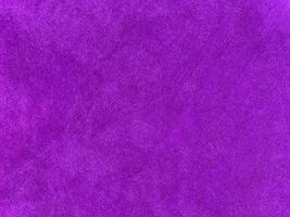 Purple velvet fabric texture used as background. Empty purple fabric background of soft and smooth textile material. There is space for text.. photo