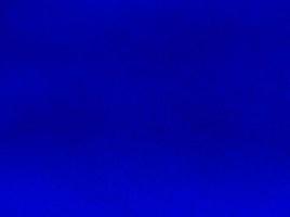 Blue velvet fabric texture used as background. Empty blue fabric background of soft and smooth textile material. There is space for text. photo