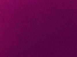 Purple velvet fabric texture used as background. Empty purple fabric background of soft and smooth textile material. There is space for text.. photo