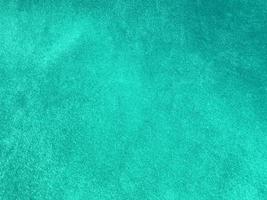 Dark green old velvet fabric texture used as background. Empty green fabric background of soft and smooth textile material. There is space for text... photo