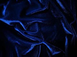 Blue velvet fabric texture used as background. Empty blue fabric background of soft and smooth textile material. There is space for text. photo