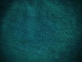 Dark green old velvet fabric texture used as background. Empty green fabric background of soft and smooth textile material. There is space for text. photo