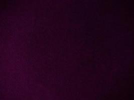 Purple velvet fabric texture used as background. Empty purple fabric background of soft and smooth textile material. There is space for text. photo