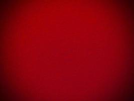 Felt red soft rough textile material background texture close up,poker table,tennis ball,table cloth. Empty red fabric background. photo
