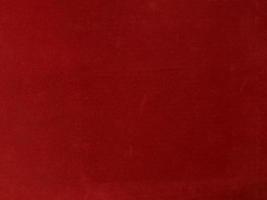 Red velvet fabric texture used as background. Empty Red fabric background of soft and smooth textile material. There is space for text. photo