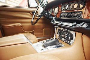 Close up view of front part of luxury old retro automobile photo