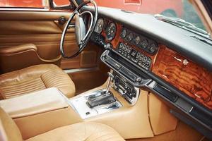 Close up view of front part of luxury old retro automobile photo