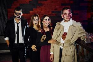 Friends is on the thematic halloween party in scary makeup and costumes photo