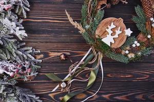 Cute cookie. Top view of christmas festive frame with new year decorations photo