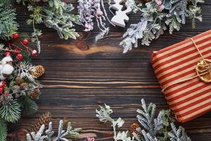 Red gift box. Top view of christmas festive frame with new year decorations photo