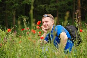 man with poppies photo