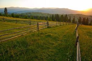 Sunset in mountains photo