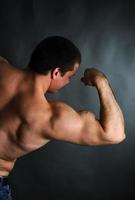 strong muscular athletic man photo