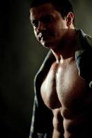 strong muscular athletic man photo