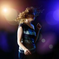 young woman dancing photo