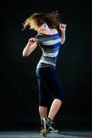 young woman dancing photo