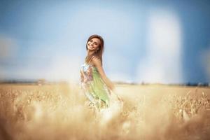 girl in wheat meadow photo