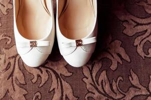 Wedding shoes with a bow photo