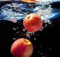 two apple in water photo