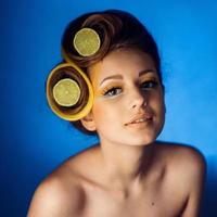 woman with fruit in hair photo