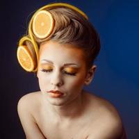 woman with fruit in hair photo