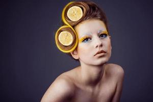 woman with fruit in hair photo