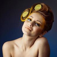 woman with fruit in hair photo