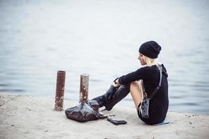 Sexy blonde girl with weapon photo