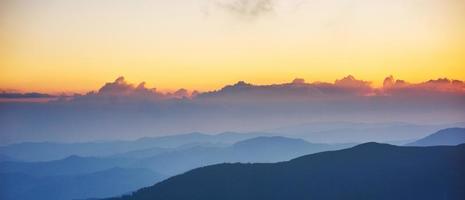 beautiful sunset in the mountains photo