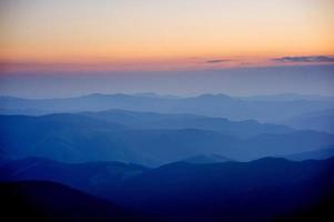 beautiful sunset in the mountains photo