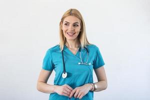 Medical concept of beautiful female doctor with stethoscope, waist up. Medical student. Woman hospital worker looking at camera and smiling photo
