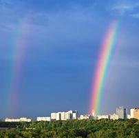 rainbows under city park photo