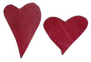 pair of red leather hearts isolated photo