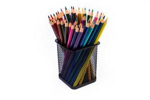 multi-colored felt-tip pens in a glass on a white background, close-up, copy space, contemporary art. Modern design photo