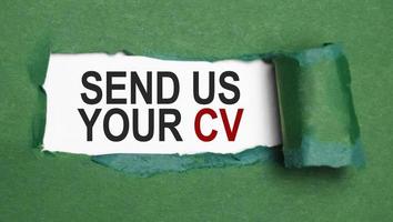 send us your cv on torn paper with green paper photo