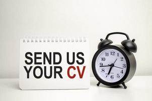 send us your cv words with calculator and clock with notebook photo