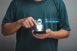 AI Chatbot intelligent digital customer service application concept, computer mobile application uses artificial intelligence chatbots automatically respond online messages to help customers instantly photo