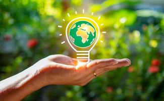 Human hand and model earth icon.Representing helping to save the environment.save world concept. photo
