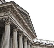 Classic architectural column. Details of the architecture of a historical building. Element of exterior building with columns and Stucco molding on the ceiling of Cathedral in St. Petersburg, Russia. photo