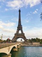 Eiffel Tower Paris View of tower, bridge and river Seine photo